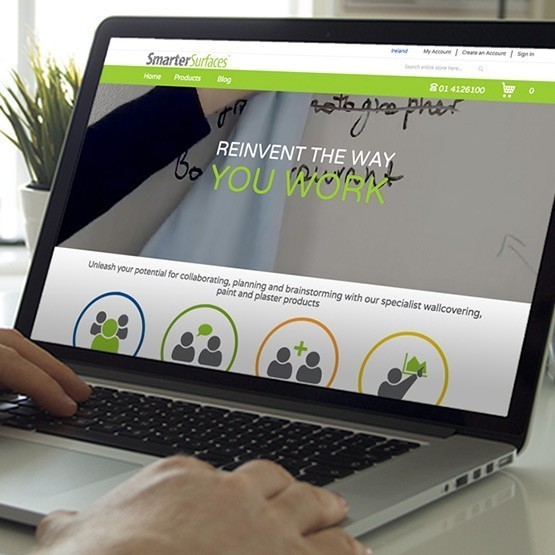 Smarter Surfaces website displayed on a laptop screen.